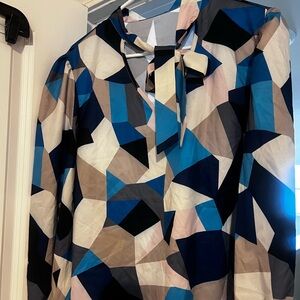 Super cute blouse. Bow tie neck. Colorful Aztec print.